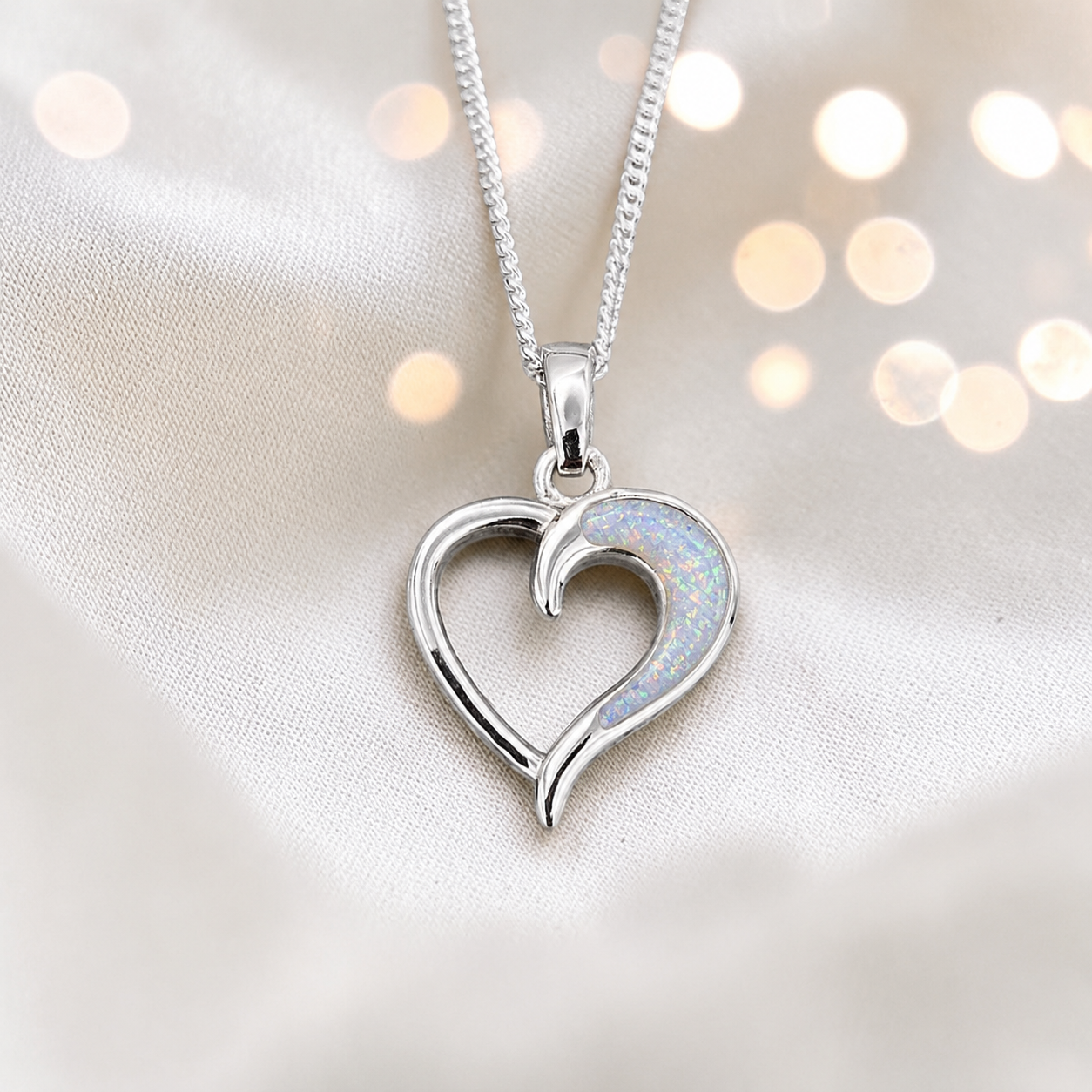 Enif Heart Ashes Pendant with white snow in single side recess, handcrafted in Lancashire, uk