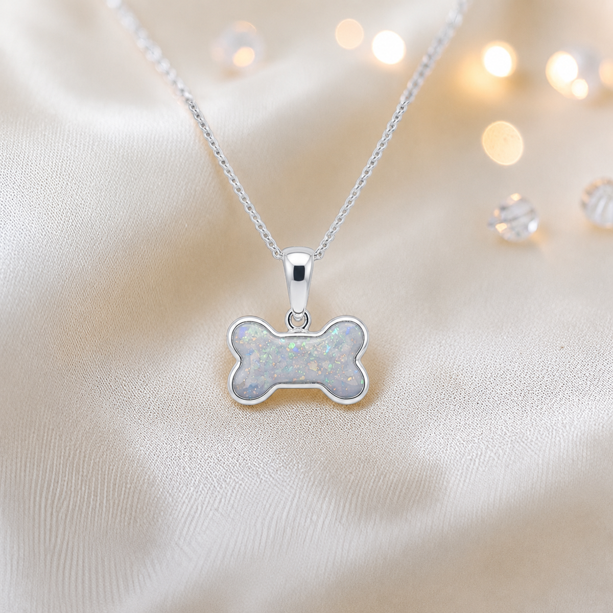 White Snow Milo sterling silver dog bone memorial pendant, handcrafted in Lancashire UK  -  by Keepsake Memorial Jewellery