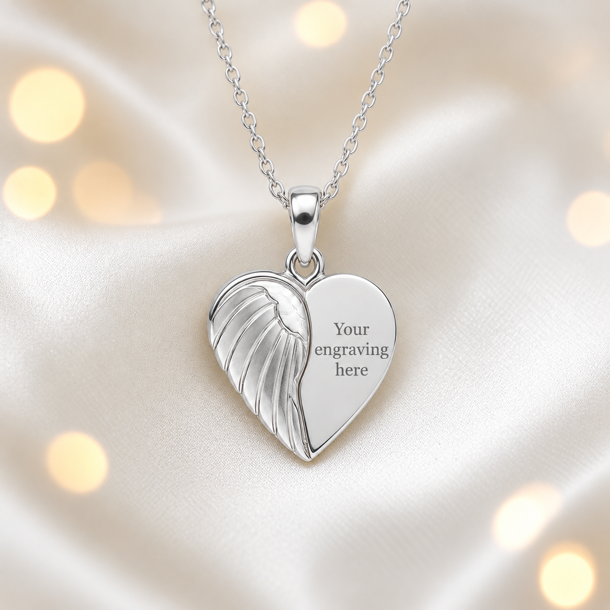 Engraved Achern angel heart ashes pendant, handcrafted in Lancashire UK - by Keepsake Memorial Jewellery