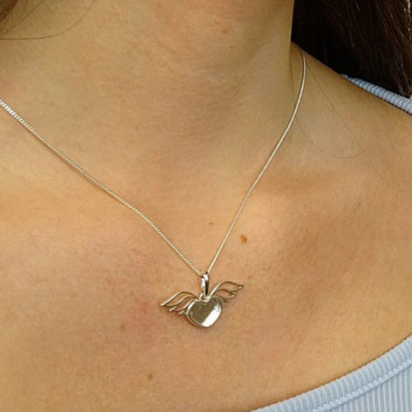 winged heart memory pendant on model uk