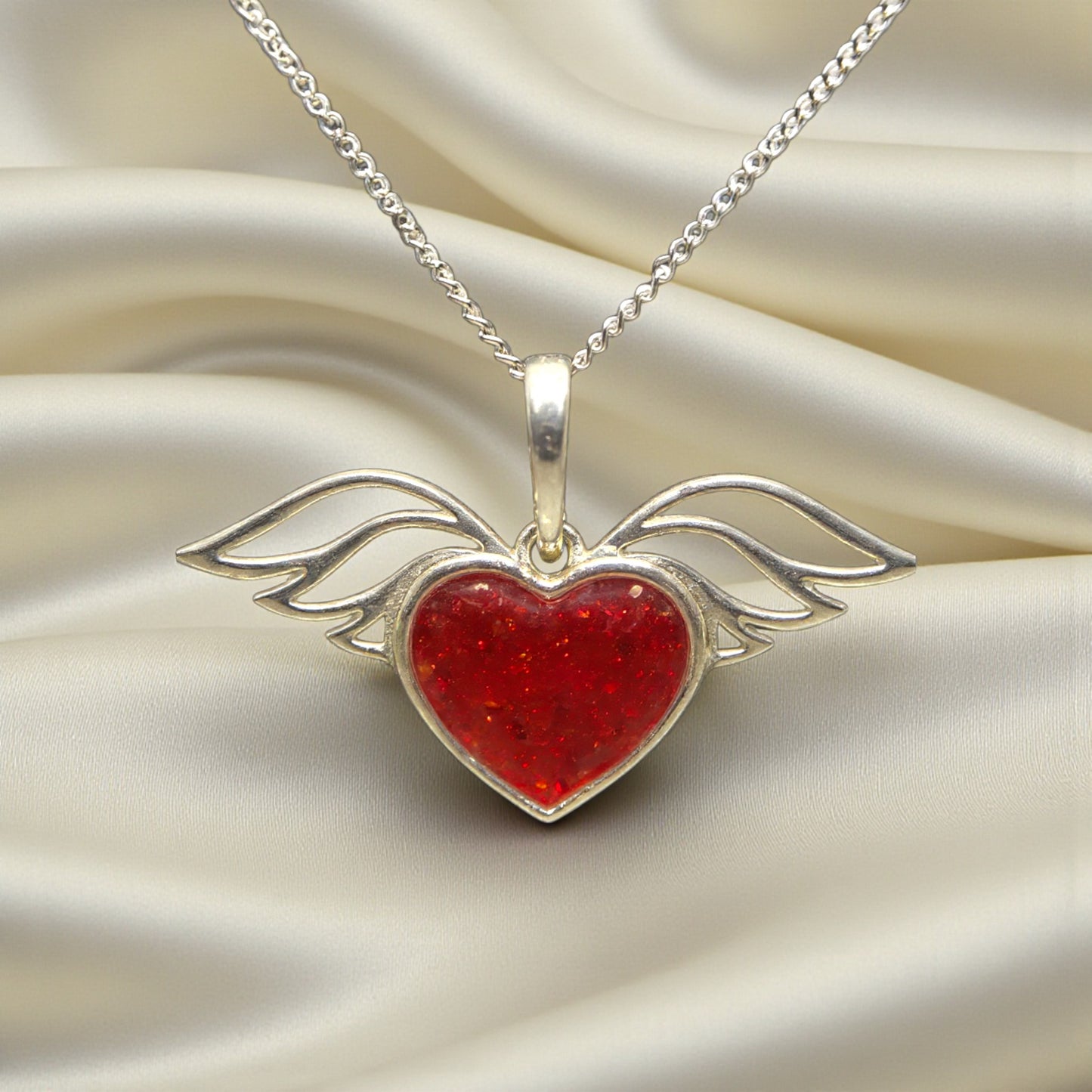silver winged heart ashes memorial pendant, handcrafted in lancashire