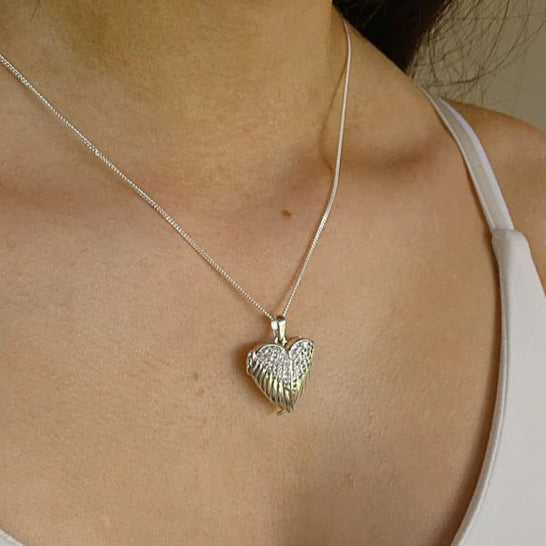 ** NEW** Solid Silver Winged Heart Locket with CZ Stones