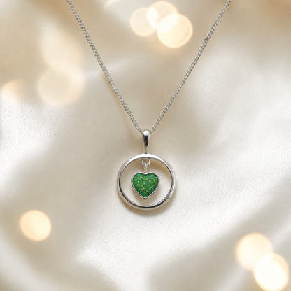 Wren silver open circle with heart drop ashes pendant in fruit green, handcrafted in Lancashire UK